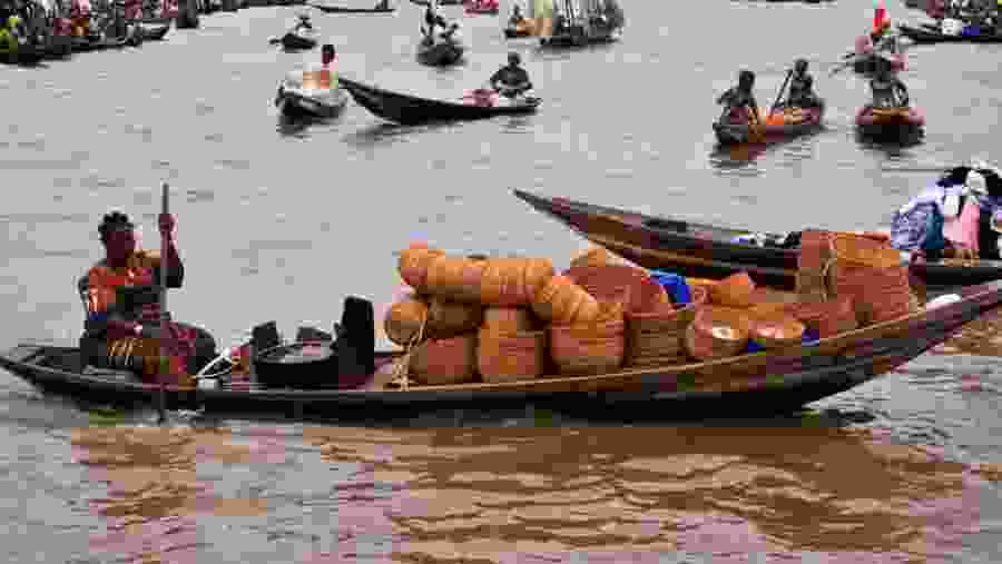 Women boating with baskets
