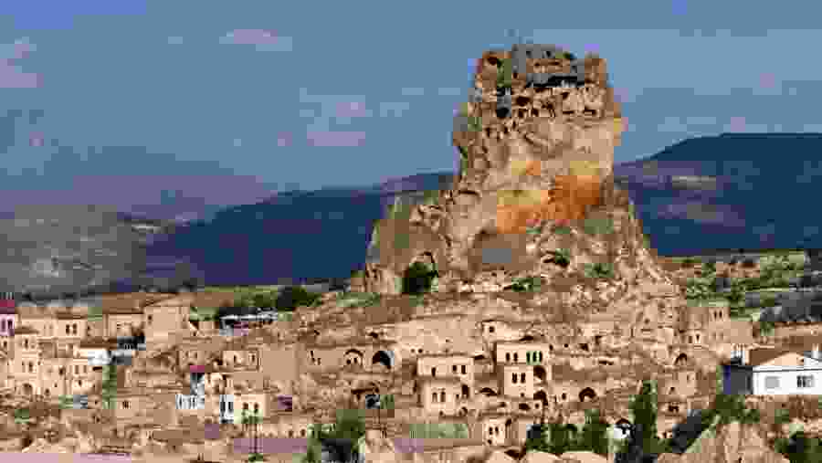 Ruins of a city carved into a rock