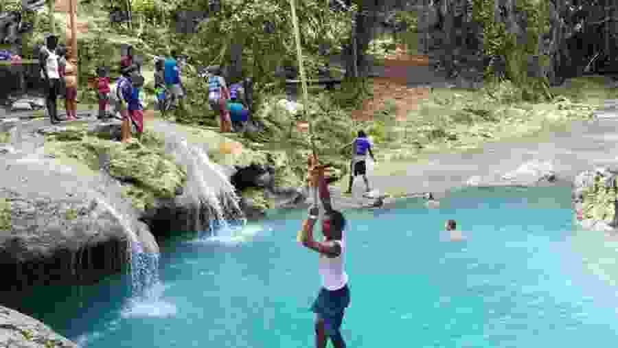 Rop Swinging at the Blue Hole in Ocho Rio, Jamaica