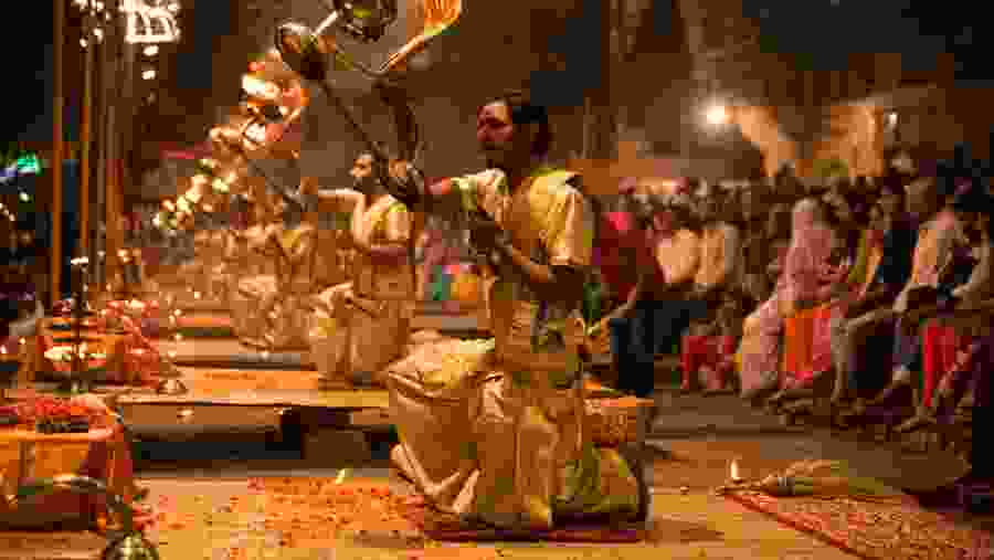 Ganga Aarti ceremony rituals performed by Hindu priests at Dashashwamedh Ghat in Varanasi.