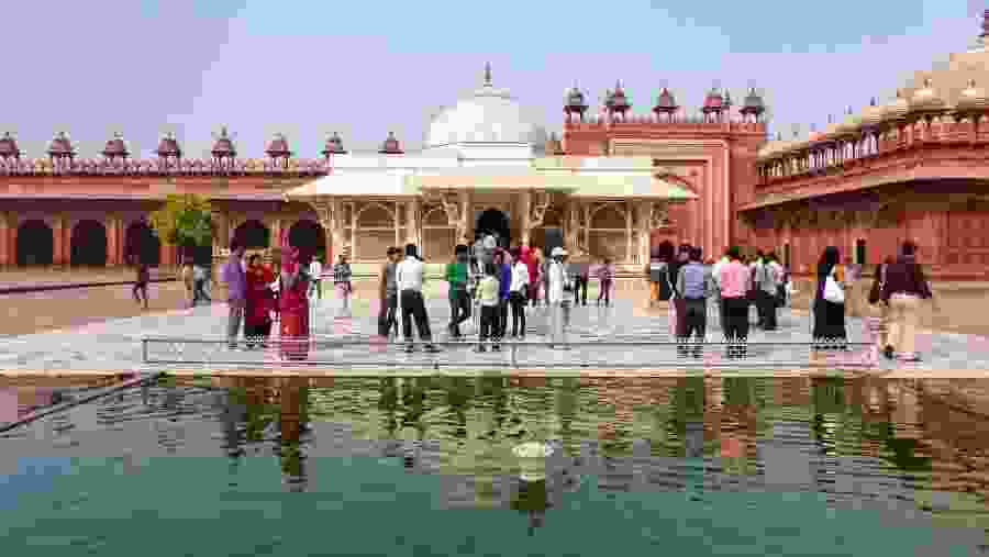People standing in front of Tomb of Salim Chishti in the Courtyard of Jama Masjid, Fatehpur Sikri