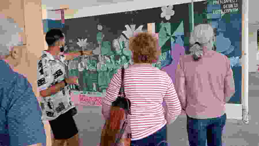 Travelers Learning About The Art