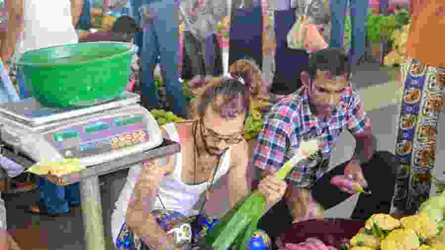 Picking vegetables at a local market, Colombo