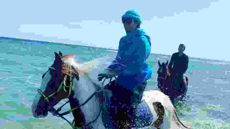 Horse riding in coastal area