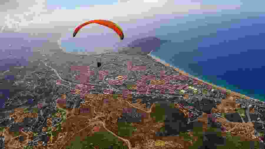 Travellers paragliding in Tandem