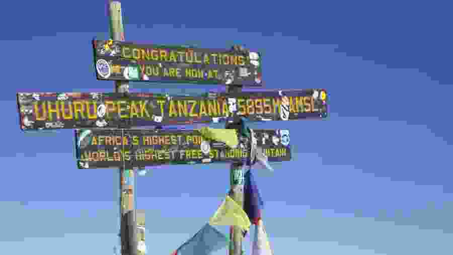 Reach Uhuru Peak, the highest point of Mount Kilimanjaro