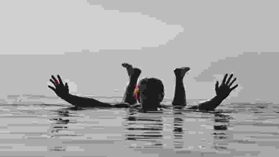 A Tourist Floating in the Dead Sea