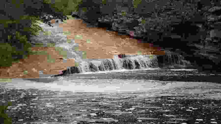 Admire the Sossego Waterfall
