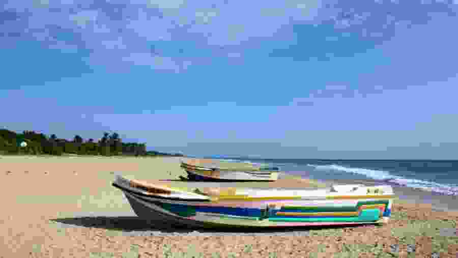 Walk on deserted the Nilaveli Beach in Trincomalee in Sri Lanka