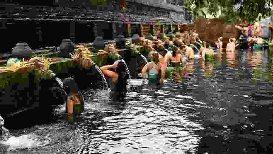Tirta Empul Temple Tirta Empul means Holy Spring in Balinese. The temple compound consists of a petirtaan or bathing structure, famous for its holy spring water, where Balinese Hindus go to for ritual purification. The temple pond has a spring which gives