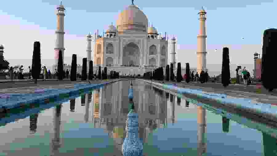 Visit the Taj Mahal at sunrise