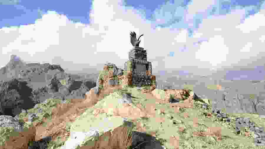 Climb through the rocky trail to the top