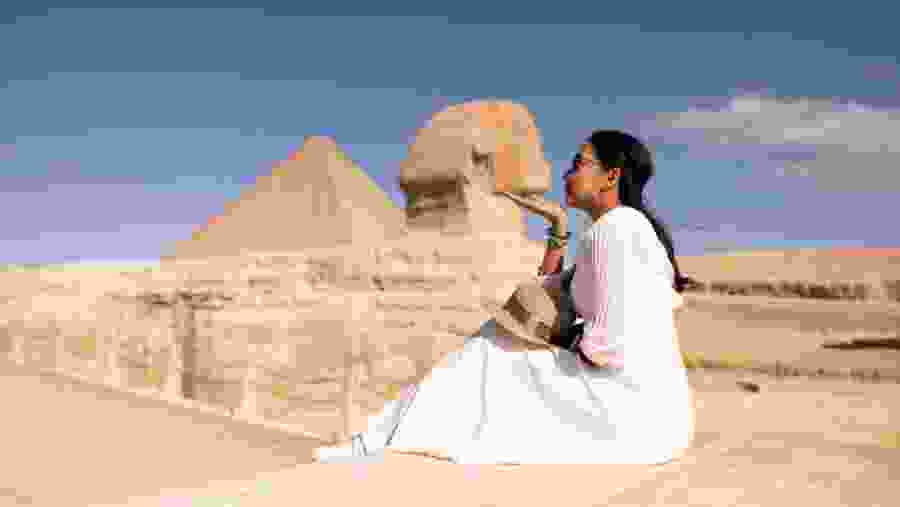 Traveller next to the Great Sphinx of Giza