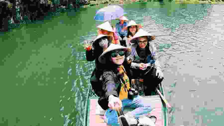 Enjoy boating in the Tam Coc River