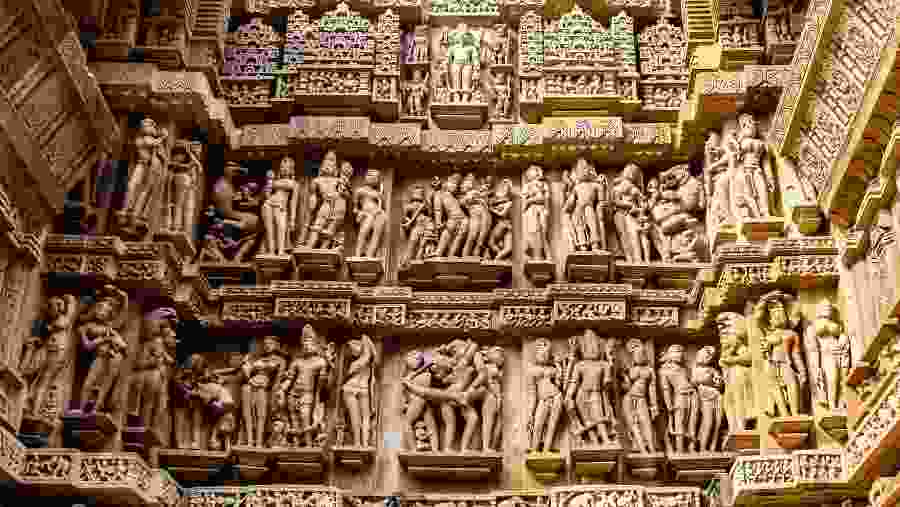 Close up of artful carved walls of Kandariya Mahadeva Temple, Khajuraho Group of Monuments, India