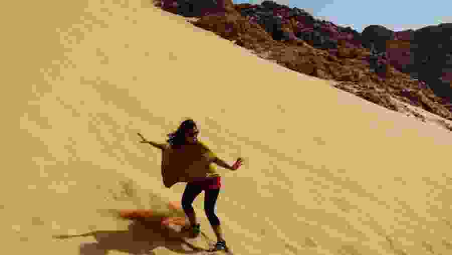 A tourist Enjoying At The Safra Dune