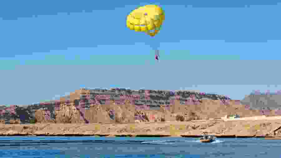 Travelers paragliding in Sharm el-Sheikh