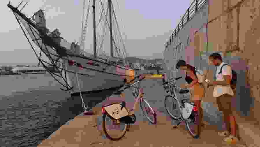 Travellers cycling in Ibiza