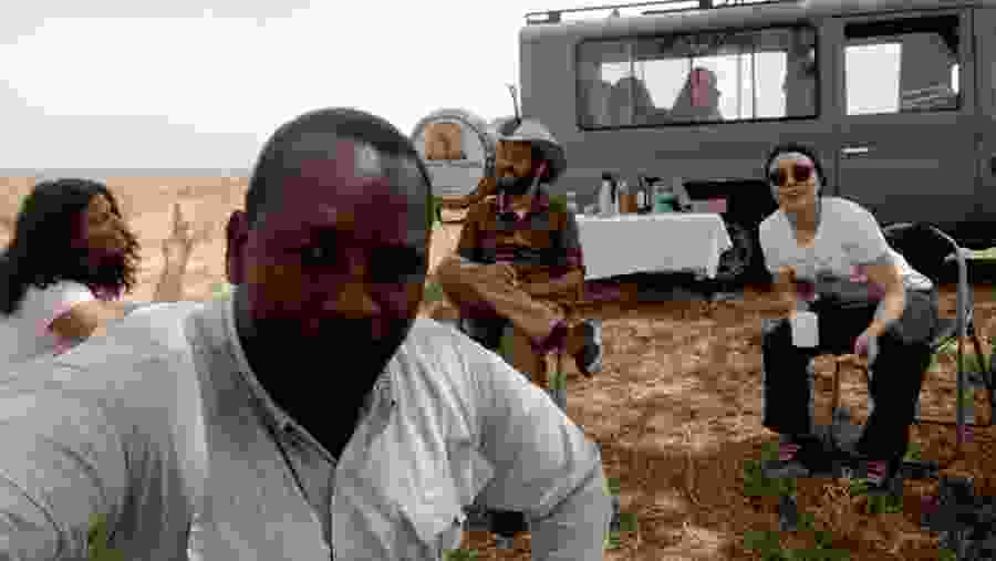 Happy tourists with the guide