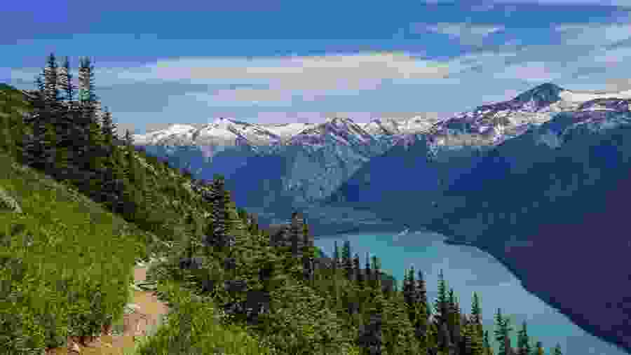 Pass by the awe-inspiring mountainous landscape