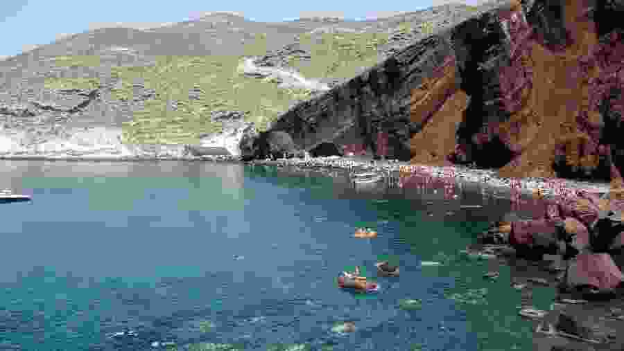 Go to the stunning Red Beach
