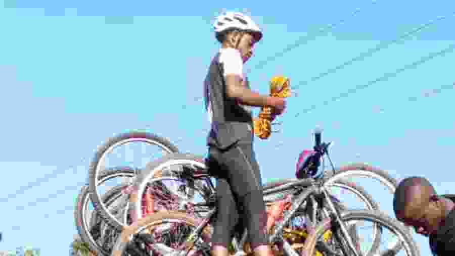 Traveller with their cycle in Tarangire National Park