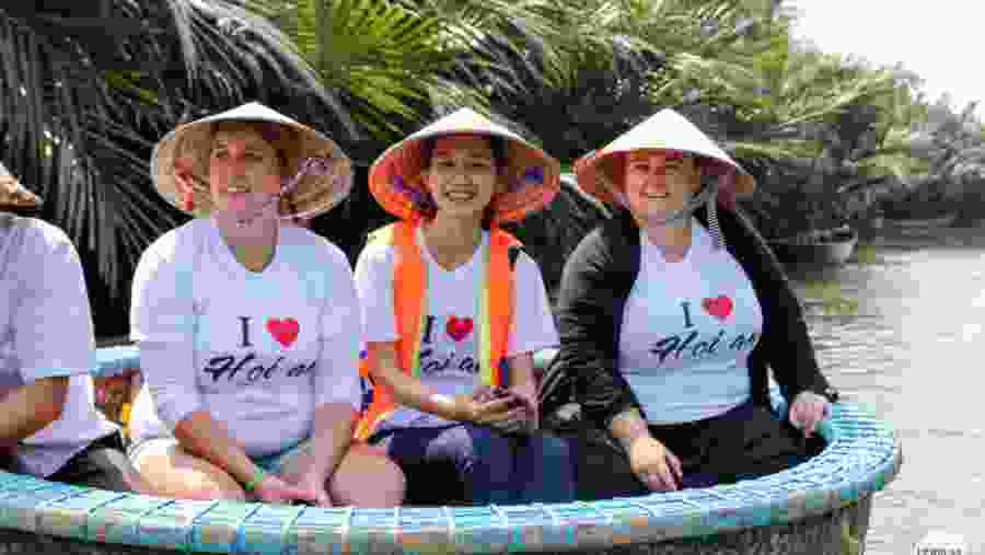 Tourists Enjoying Bamboo Boat Ride