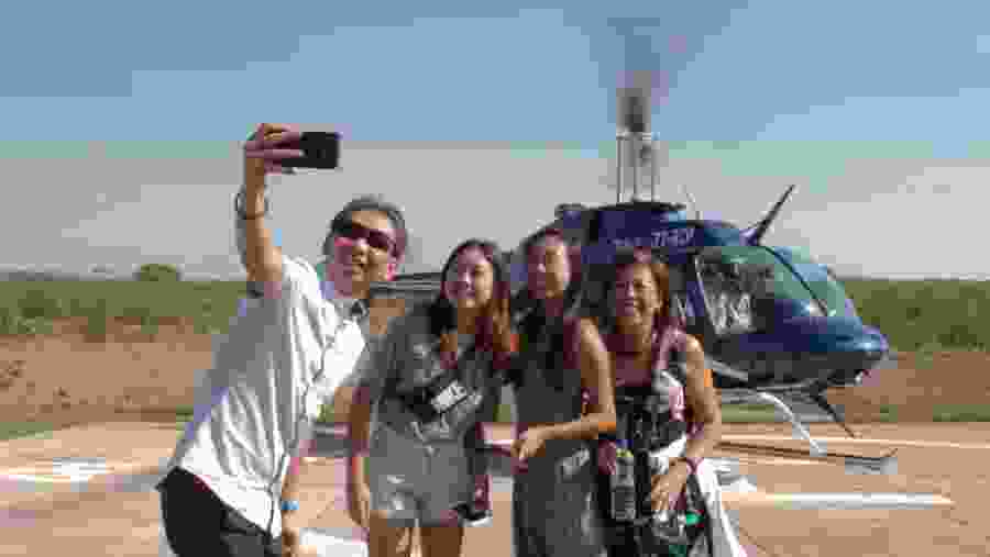 Happy tourists at the Helipad