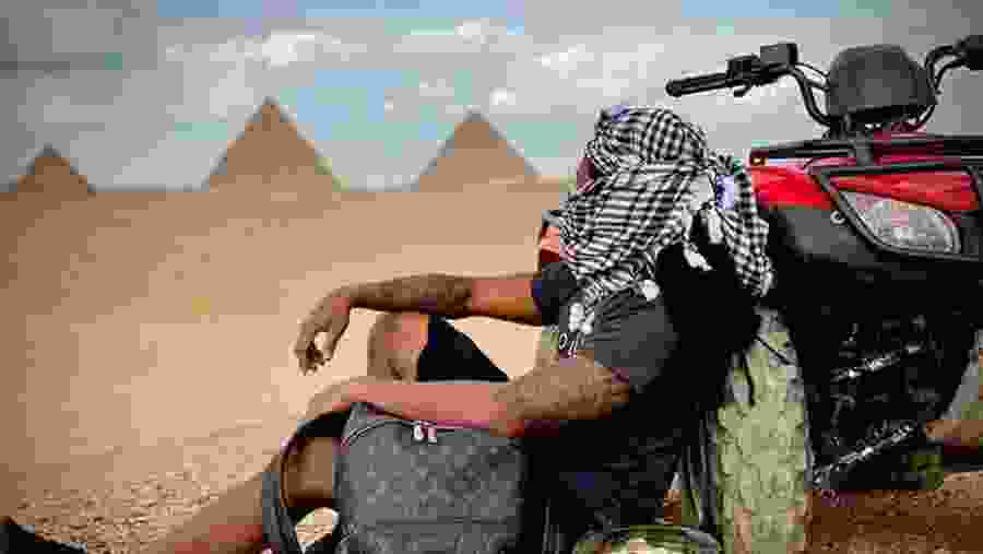 Ride ATV around the pyramids