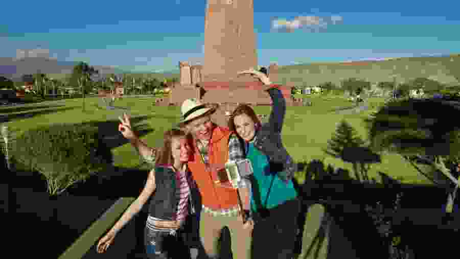 Tourists at the La Mitad del Mundo in Quito