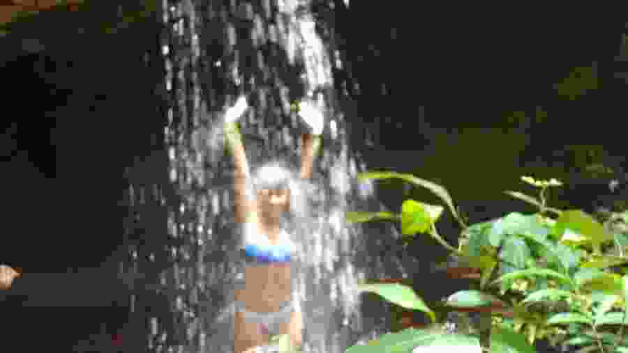 Enjoying under the Fonte do Céu Waterfall