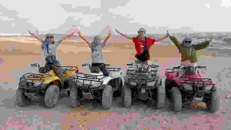 Tourists on ATV Quad Bikes at Giza Pyramid