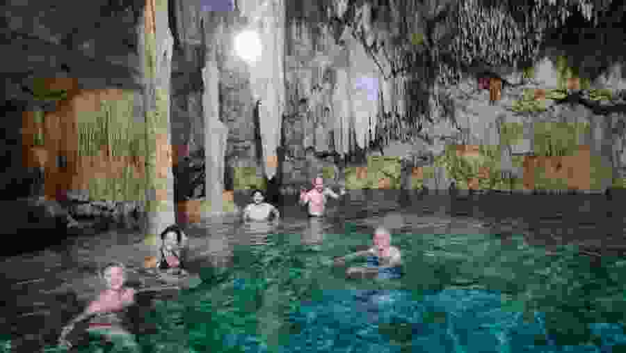 Travelers in a private cenote