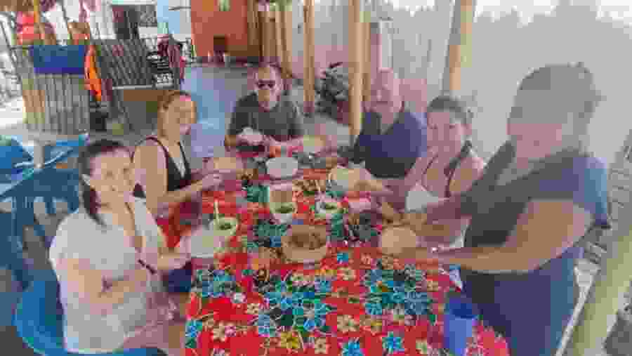 Travelers at a food experience at Izamal