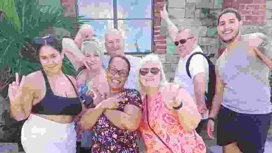 Tourists posing at the Antigua and Barbuda Tour