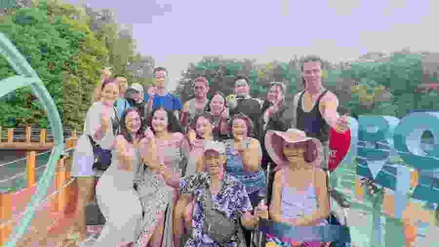 Group photo with a scenic background