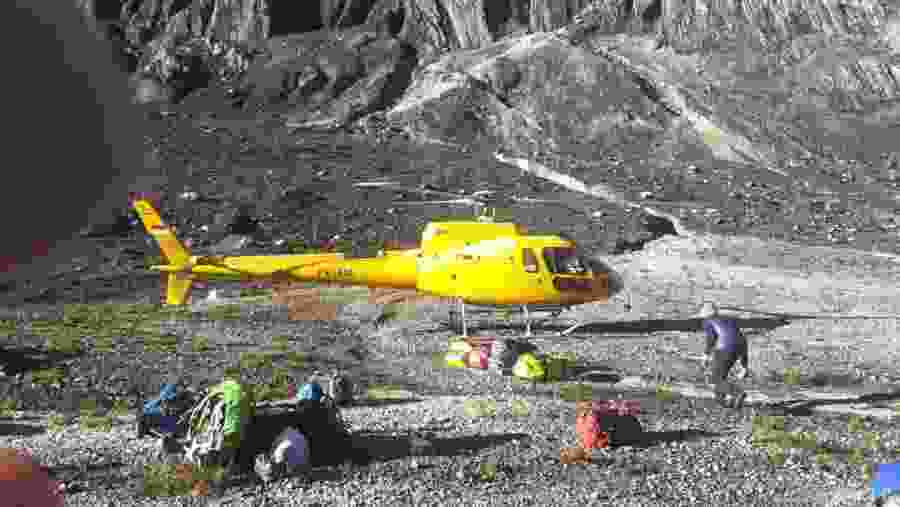 ride a helicopter to base camp