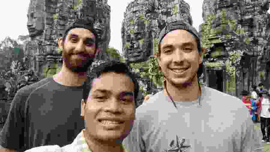 Happy tourists in Angkor Wat Complex