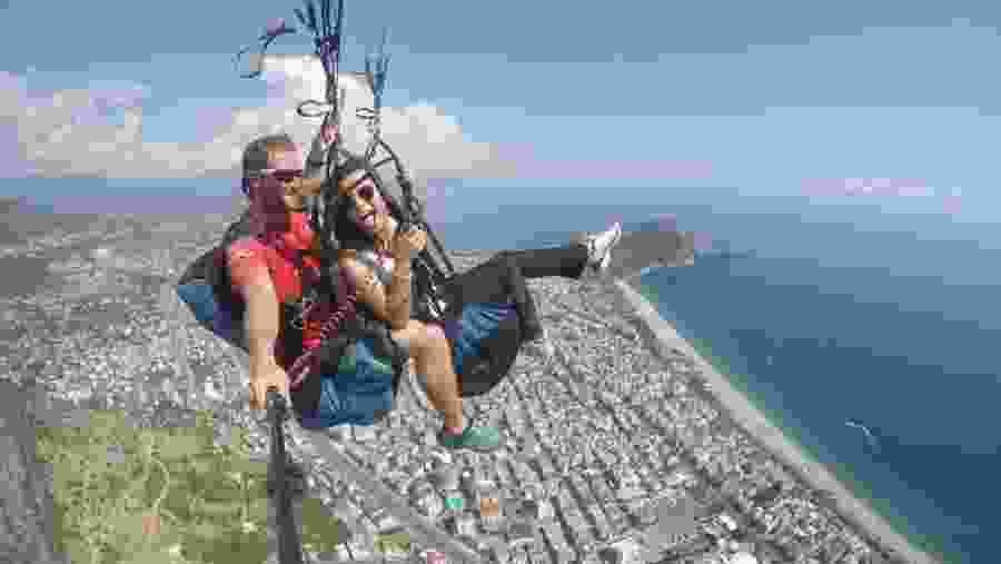 Travellers paragliding in Tandem