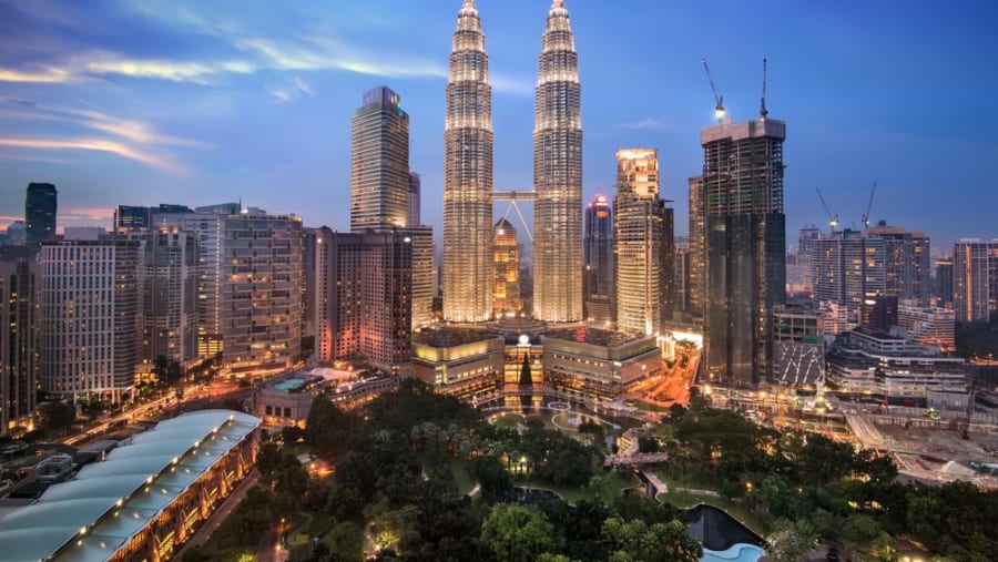 See the Petronas Twin Towers of Kuala Lumpur
