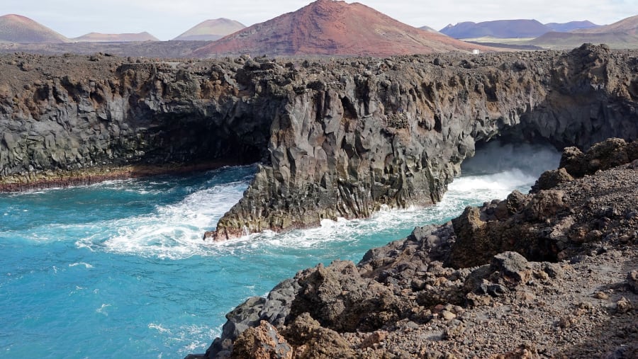 Admire the stunning panoramic view of Los Hervideros