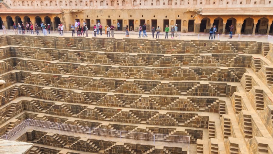 Our Tourist are watching Chand Baori with Guide.
