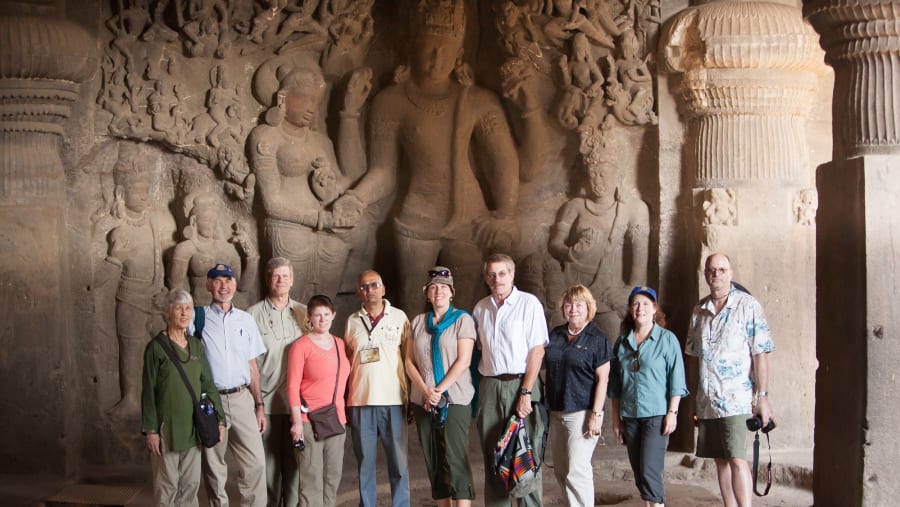 A group of American tourists touring the Ellora caves.