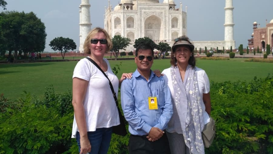 Tourists Posing Infront Of Taj Mahal