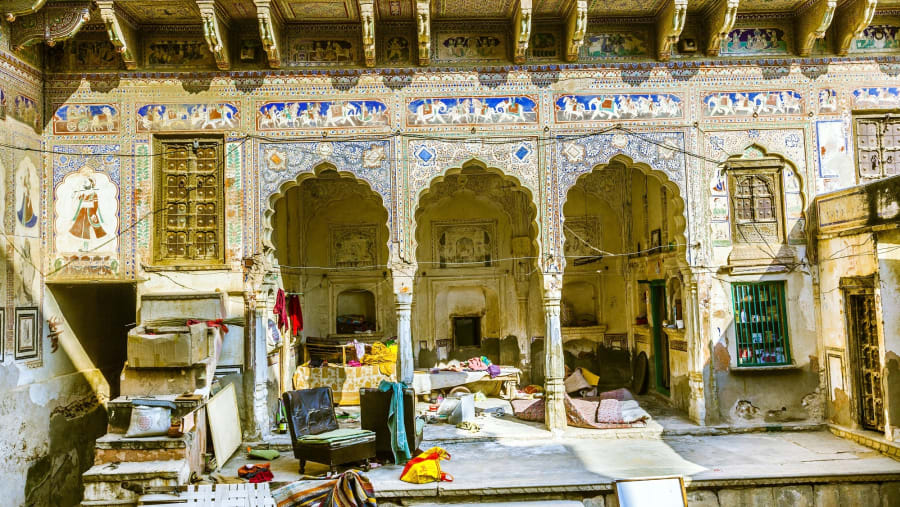 People in beautiful old haveli in Mandawa