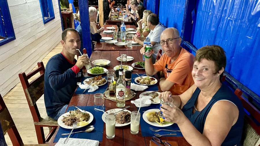 Tourists enjoying local Cuban food