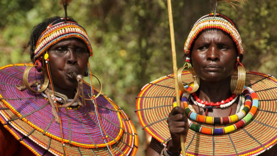 Maasai women with intricate colorful beaded jewelry and necklaces