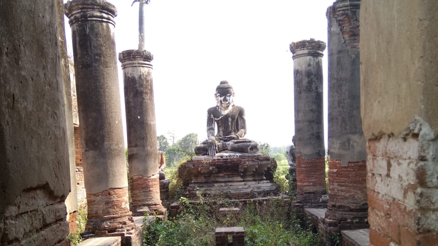 Temple Ruins And Buddha Statue In Ava
