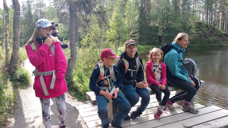 Tourists having a break on their hike