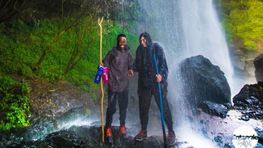 Under the waterfall